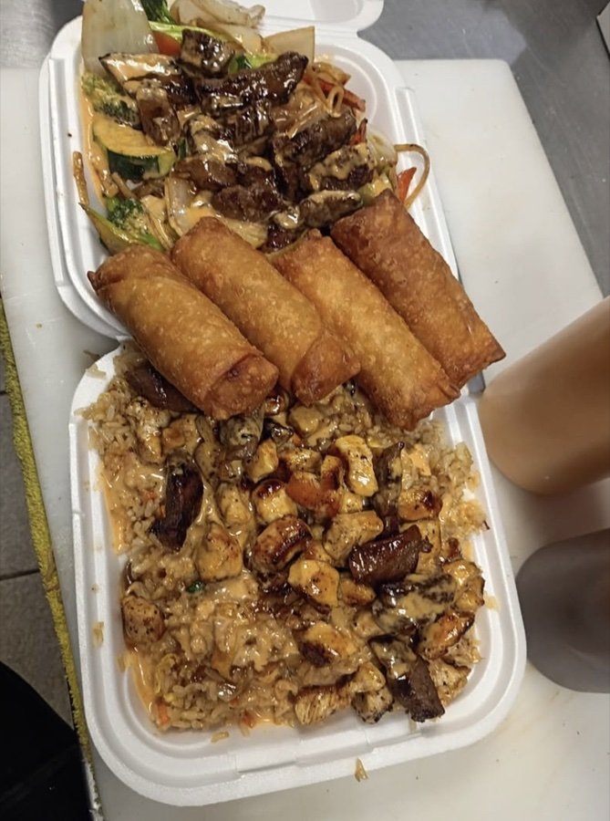 Eggrolls and sides with fried rice