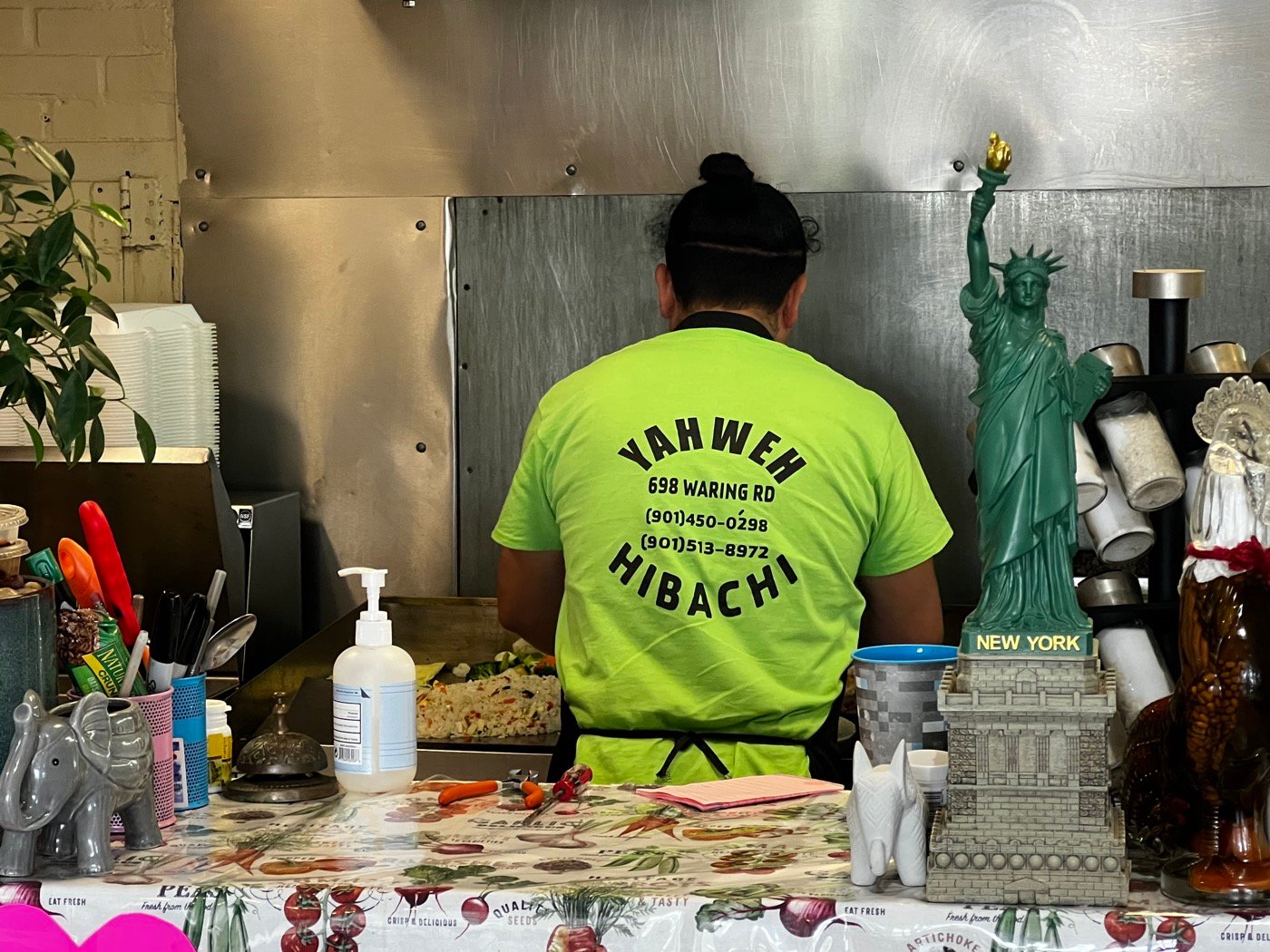 Felipe cooking hibachi on the flat grill — Yahweh Tecan