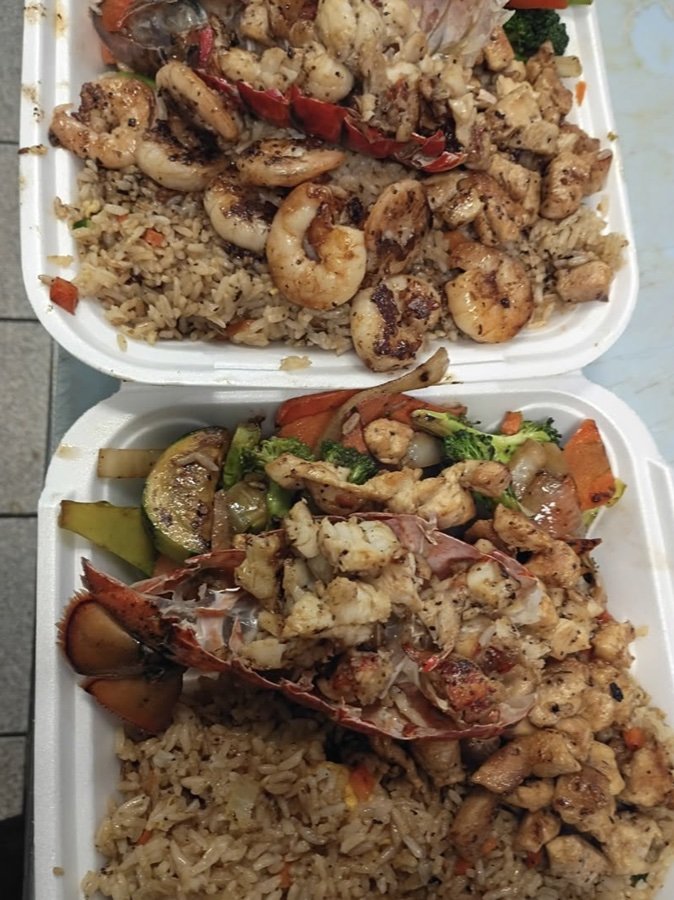 Two loaded hibachi plates